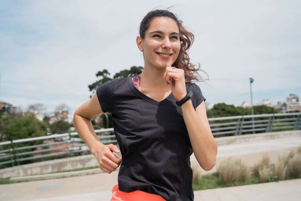 portrait of fitness woman running