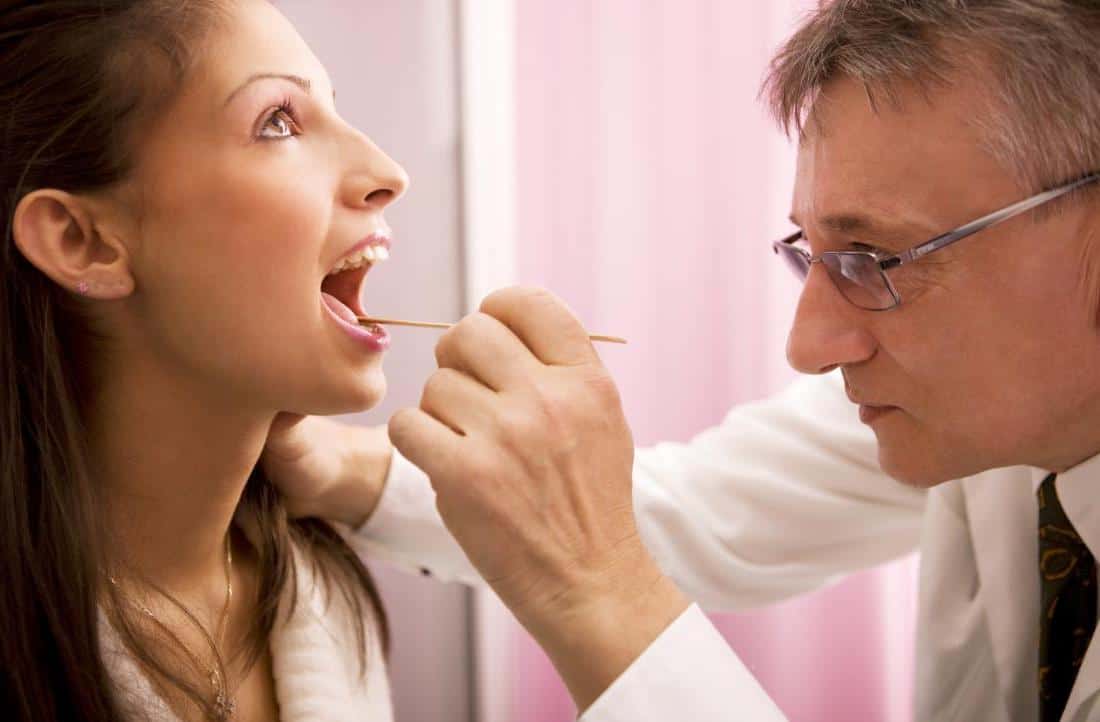 exame de lingua bolinhas na lingua